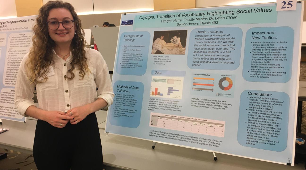 student with poster