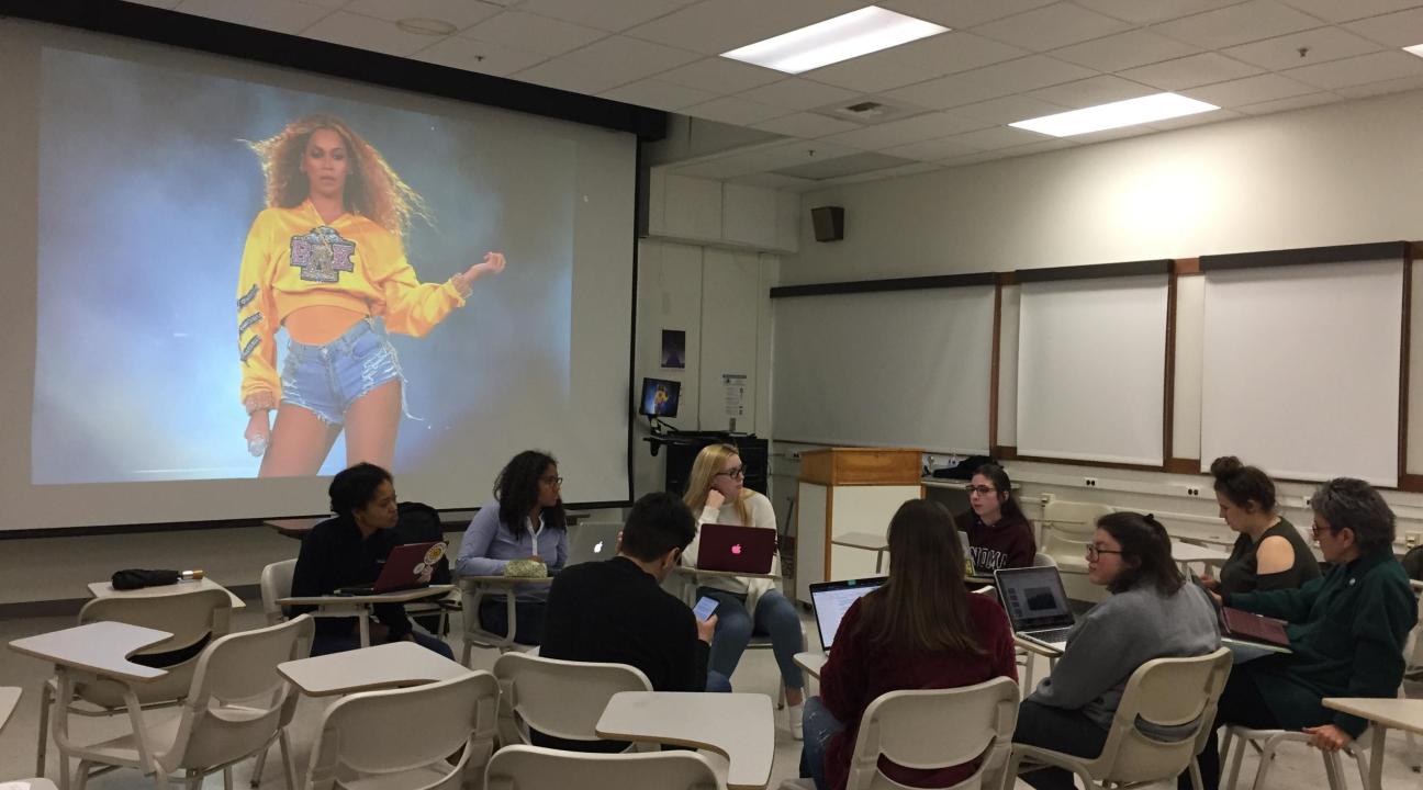students in classroom watching Beyonce