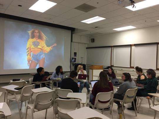 students in classroom watching Beyonce